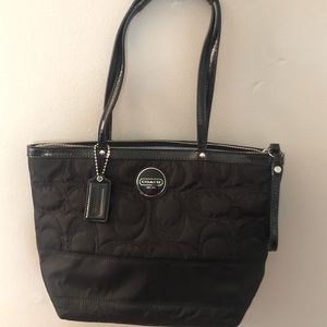 black Coach shoulder bag with baby blue lining